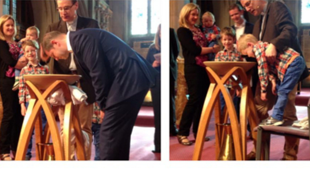 2 photos of father and son being baptised at the same service by Trevor Mapstone