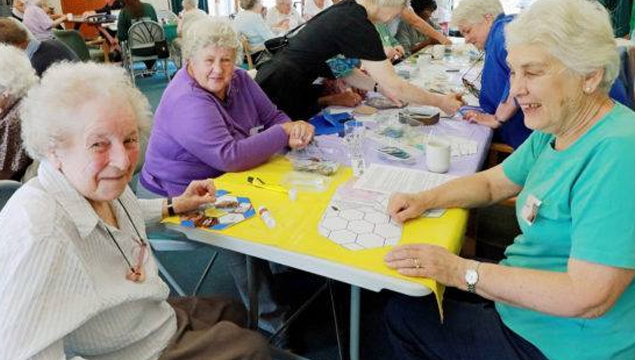 photo of respite group doing craft activities